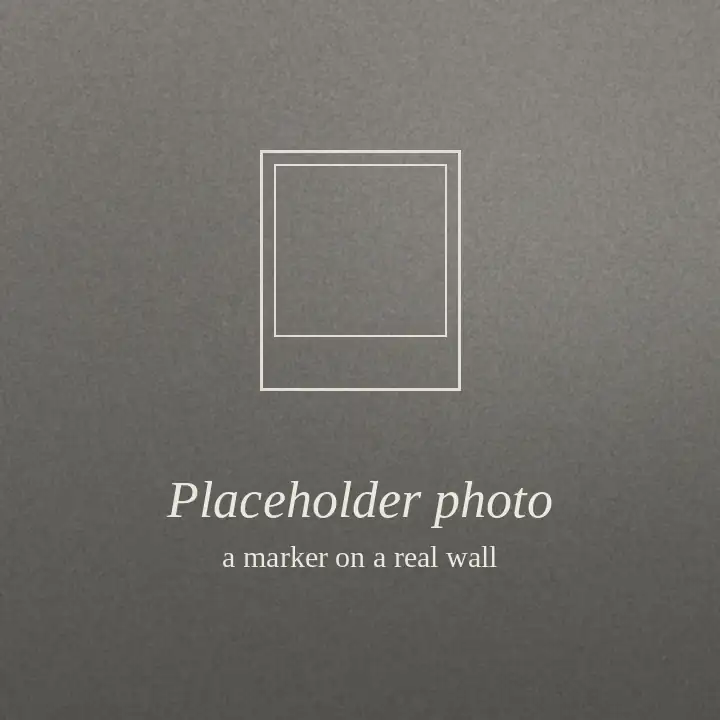 Placeholder: a grey square with the outline of a marker, standing in for a photo of a real marker on a wall.